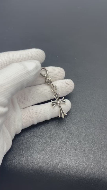 TINY CH CROSS WITH ONE SILVER BALL CHARM